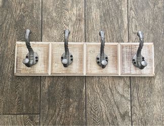 Iron mounted coat rack  $15