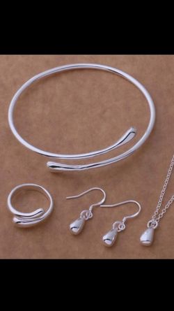 Four piece sterling silver set stamped 925! Brand new!