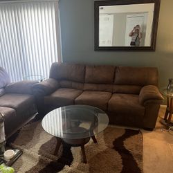 Couch,love seat,coffee table, 2 end tables, 2 lamps And rug!
