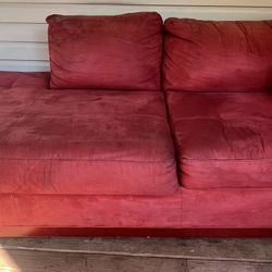 Set Of Two Red Sofas.