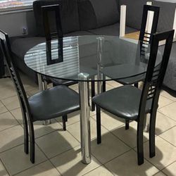 Glass Dining table & 4 Black chairs