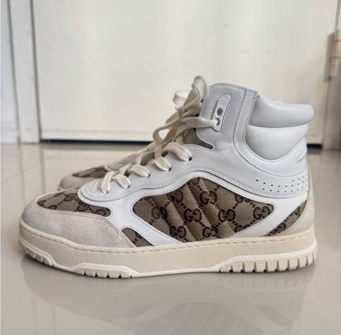 Gucci high-top sneakers with the iconic GG monogram canvas and white leather trim Size 8