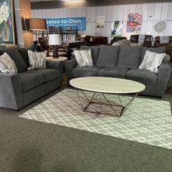 8 Piece Living Room Set. Includes Sofa Loveseat Table 2 End Tables 2 Lamps And Rug