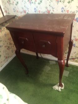 Antique sewing machine table