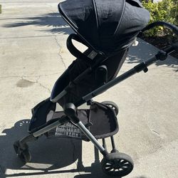 Evenflo Pivot Xpand Stroller With Car Seat And Base.