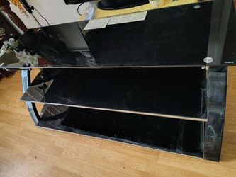 Tv stand glass hold up to 75 must come pick up