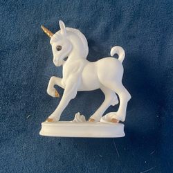 Porcelain Unicorn With gold trim 