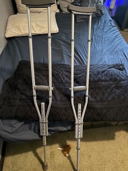 Adjustable crutches