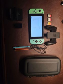 Nintendo Switch with Accessories and Game Cards