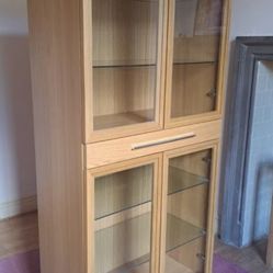 Beautiful 4 door glass display cabinet. Like new!!