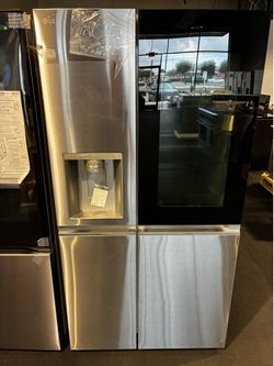 New LG insterview stainless steel side by side refrigerator