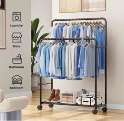 Brand new double garment rack with wheels