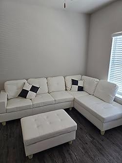 New White Leather Sectional And Ottoman 