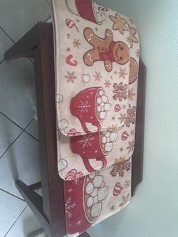 Festive set of gingerbread themed Christmas kitchen rugs, placemats and towels