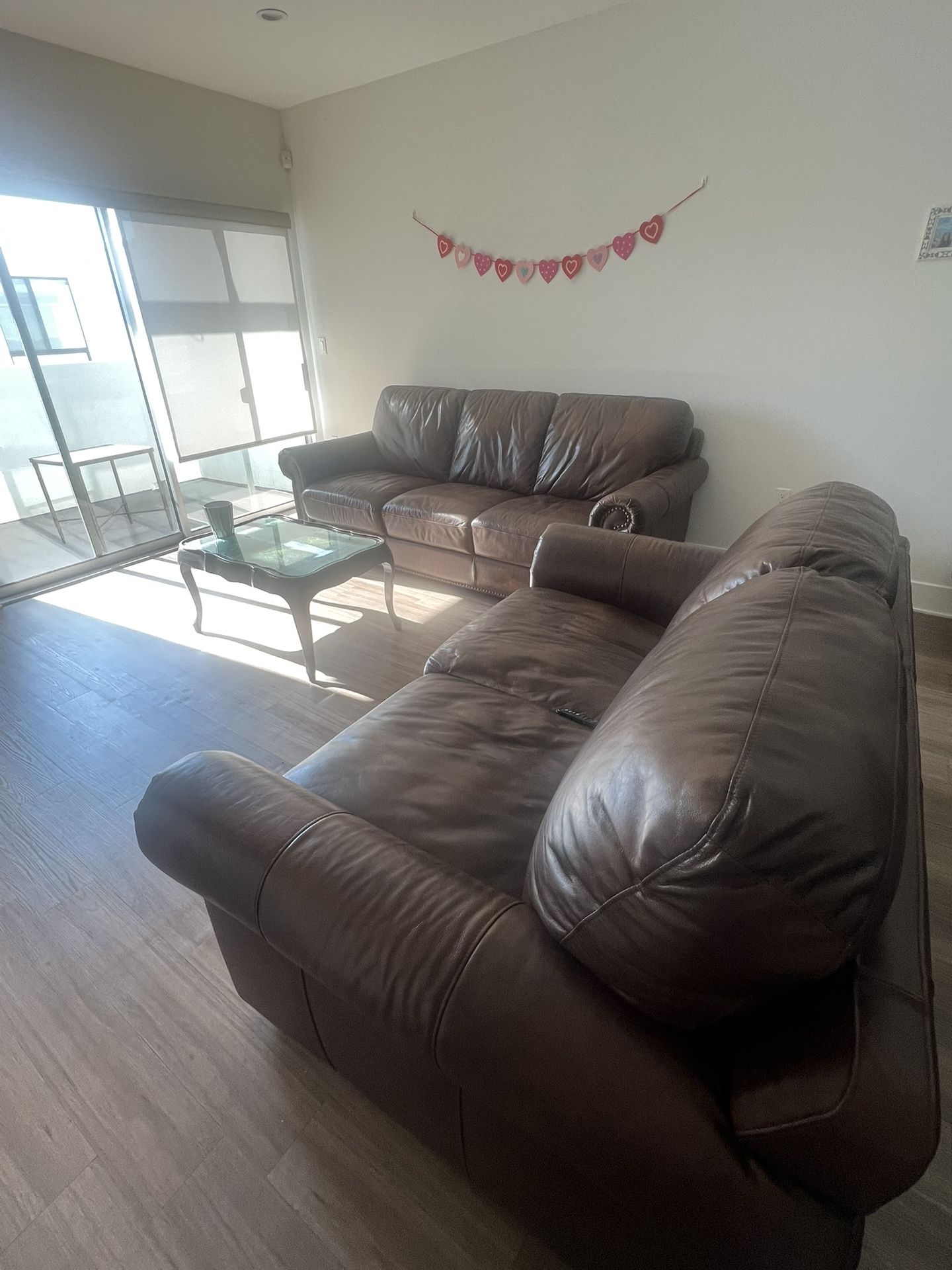 Brown leather couches