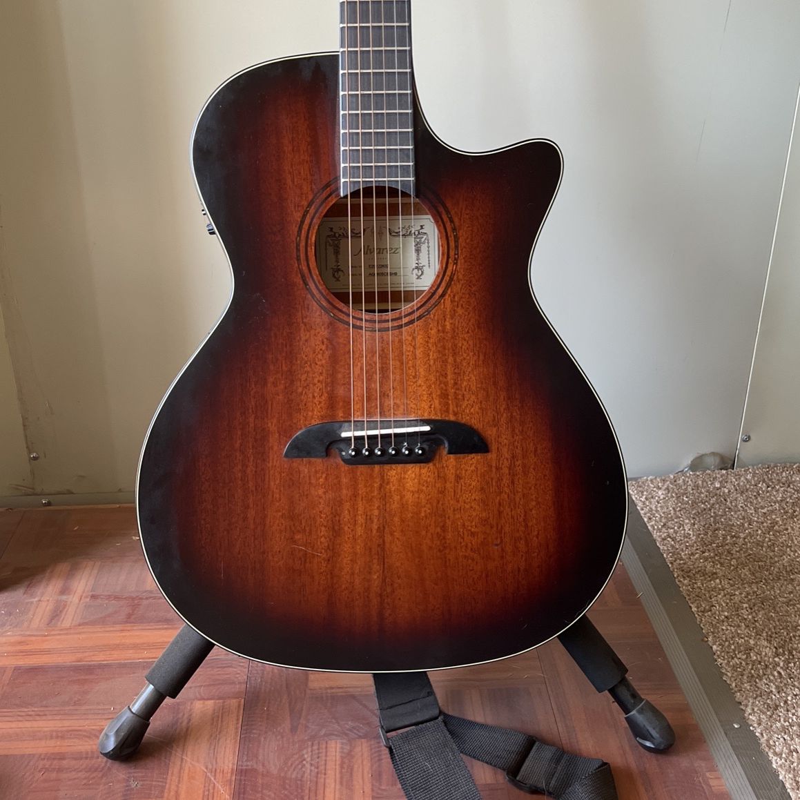 Alvarez Acoustic Electric Guitar, Built In Tuner. With Stand And Capo