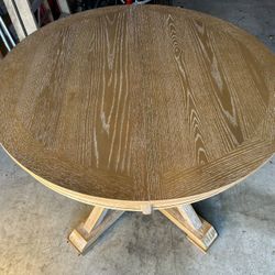 Round Table With Natural Finish 