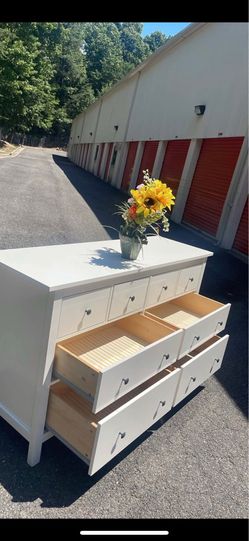 Modern solid wood white long dresser. Drawers sliding smoothly