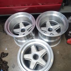 Porsche RSR aluminum wheels 1 front wheel 10 1/2in wide and 2 rear wheels 14in wide wheels need to be fixed one has a crack look at photos wheels are 