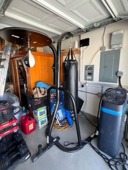 dual-station boxing stand (or a heavy bag and speed bag combo stand)