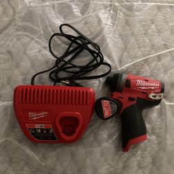 New 12 V Impact New battery Charger.