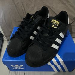 Black Adidas Superstars