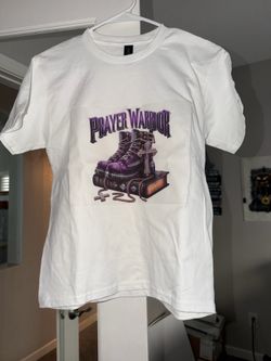 Premium graphic tees featuring faith, empowerment, and inspirational designs.