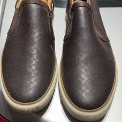 Brown Coach logo slip on tennis shoes