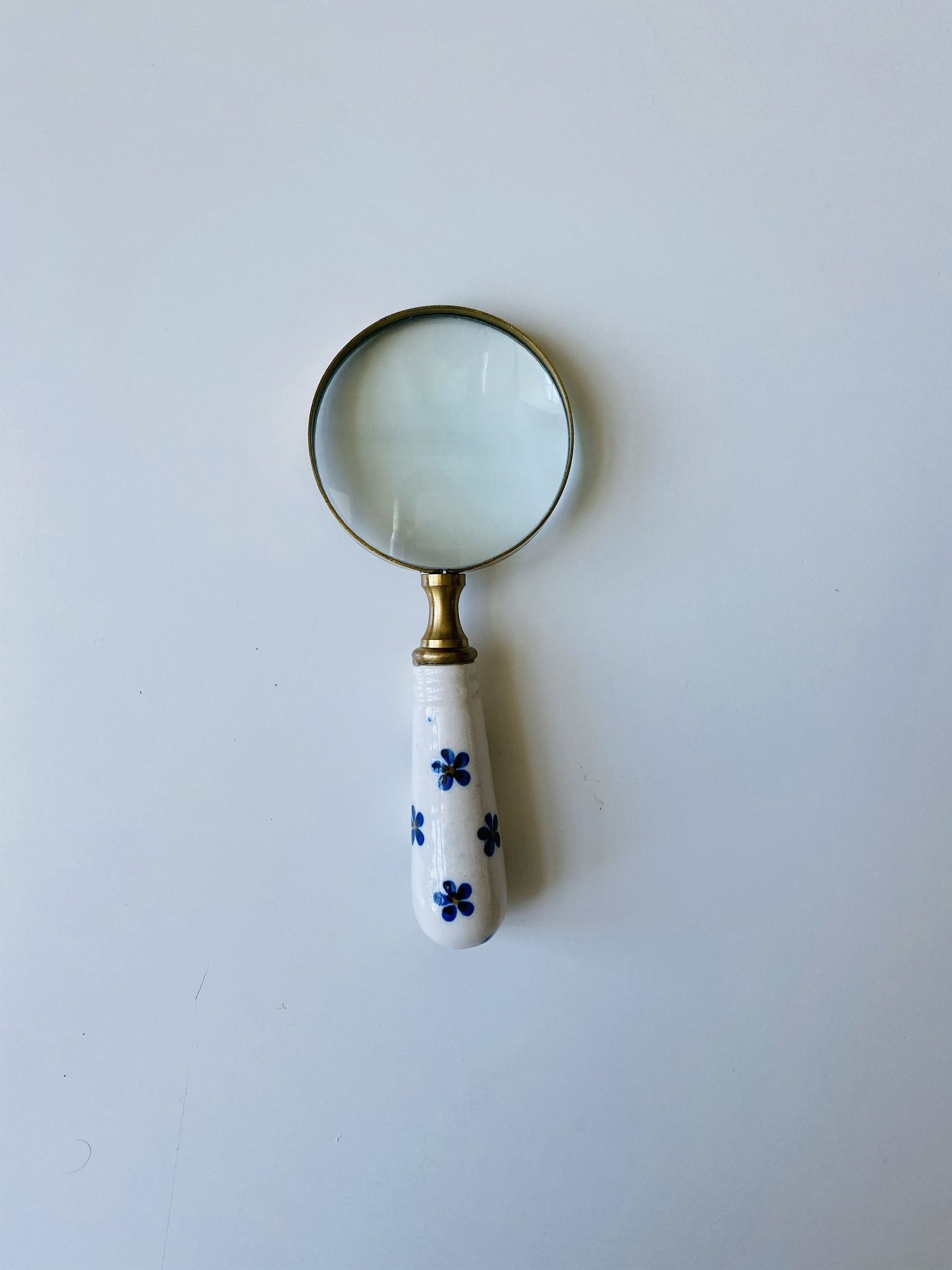 Vintage Antique loupe. Bronze; porcelain; high polished glass. Very functional great decoration for any home. Like new condition.