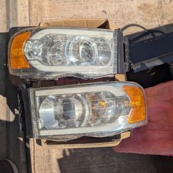 2003 2004 DODGE RAM HEADLIGHTS WITH LED Bulbs.
