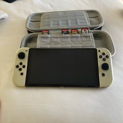 Nintendo Switch OLED  +games