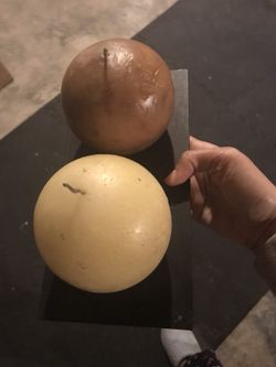 Two round candles and holder plate