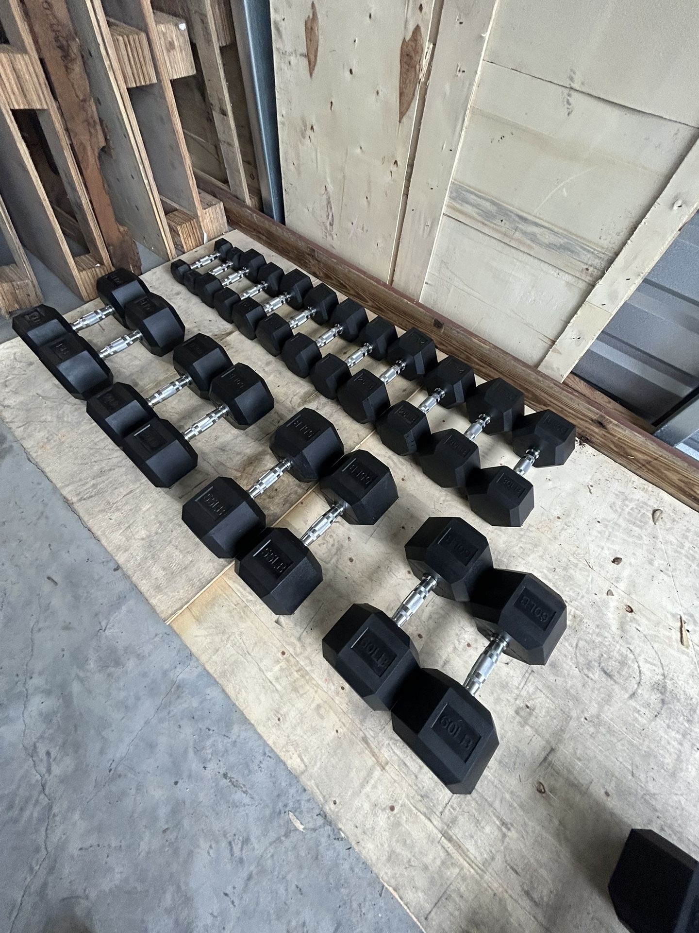 New pair of 51015202530455055 and 60lb rubber dumbbells NEW IN BOX $630