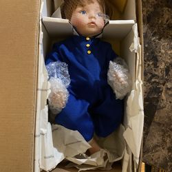 Porcelain baby doll you deserve a break today with Ronald McDonald figure