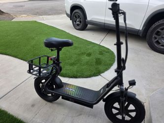 Electric Scooter With Seat