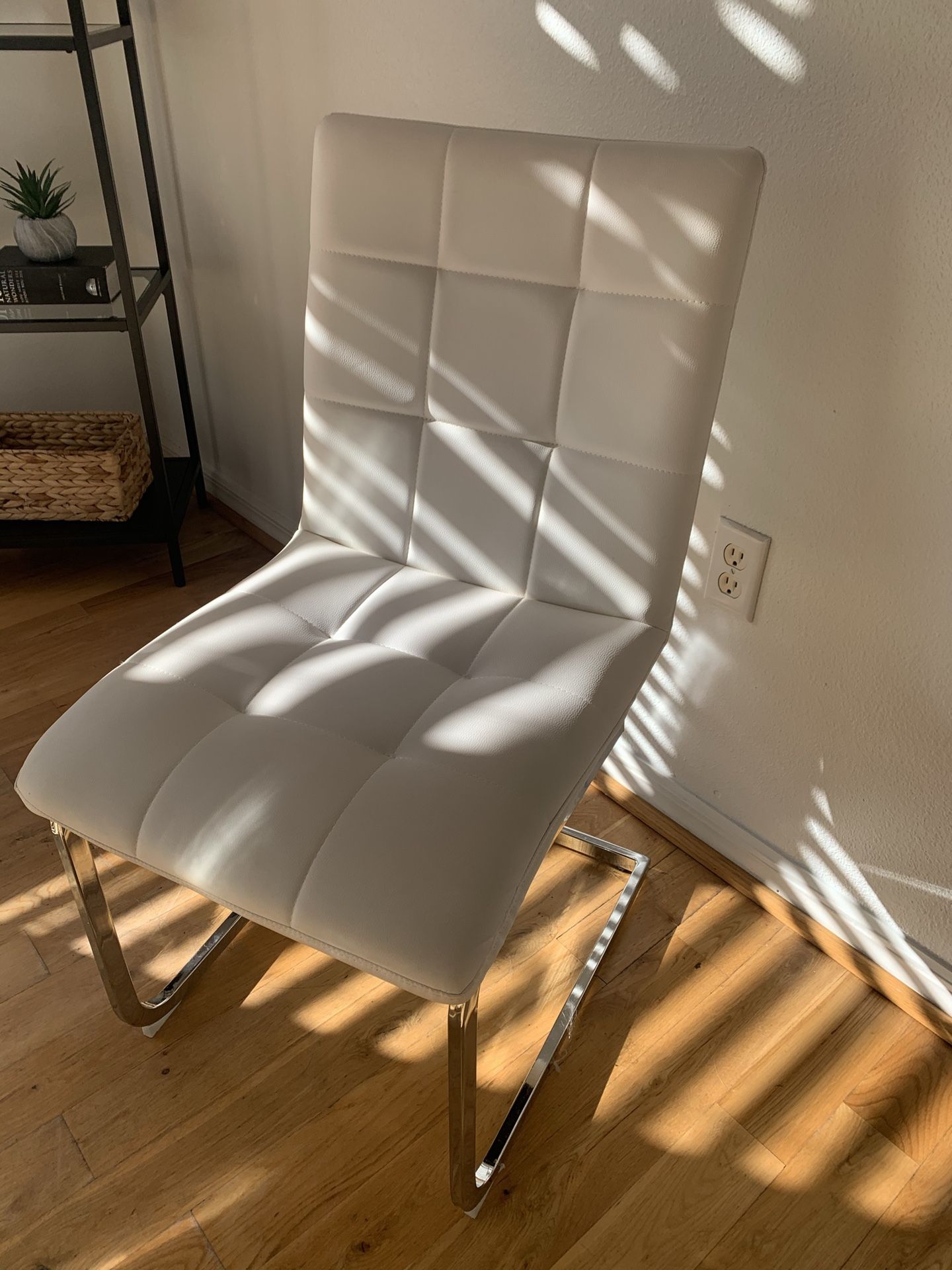 4 White Leather dining room chairs in great condition