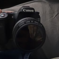 Canon EOS 70D Camera Bundle with EF 50mm f/1.4 & EF 75-300mm Lenses,+2 Batteries