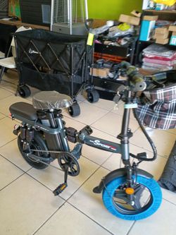 FOLDING ELECTRIC BIKE PEAK750W-25MPH-RANGE 30 MILES-DUAL SUSPENSION -DUAL DISK BRAKES. LED HEADLIGHT. TAIL LIGHT