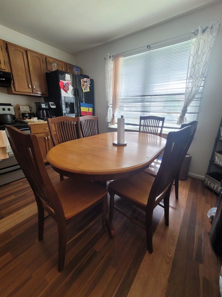large table, with 6 chairs in good condition the table expands more