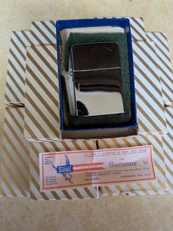 13 Brand New 1970's Zippo Lighters