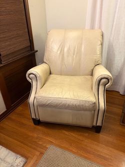Two Leather Reclining Chairs