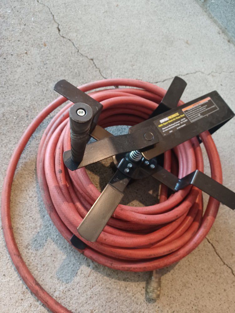 Air Hose And Reel. 50 Ft Hose . Plus Extra  100 Ft.