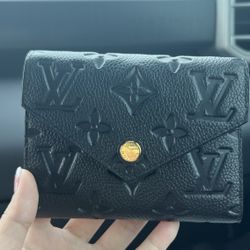 Louis Vuitton Victorine Wallet in Monogram Empreinte leather 