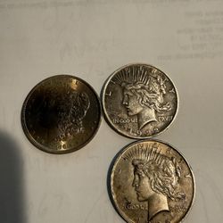 3 Sliver Dollars 1886 Morgan Silver Dollar And 2 1922 Liberty Dollars 