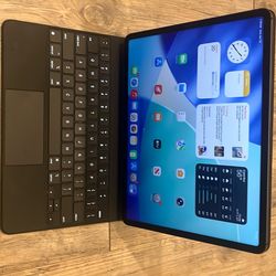 Title:  iPad Pro 12.9” 5th Gen 256GB + Magic Keyboard (M1) – Laptop Setup