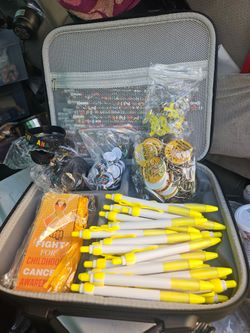 Case full of pencils pens and pins