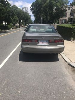 Toyota camrry 1998 v6 sedan sell or trade it have remote stared