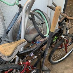 Two Children’s Bikes And Two Mountain Bicycles