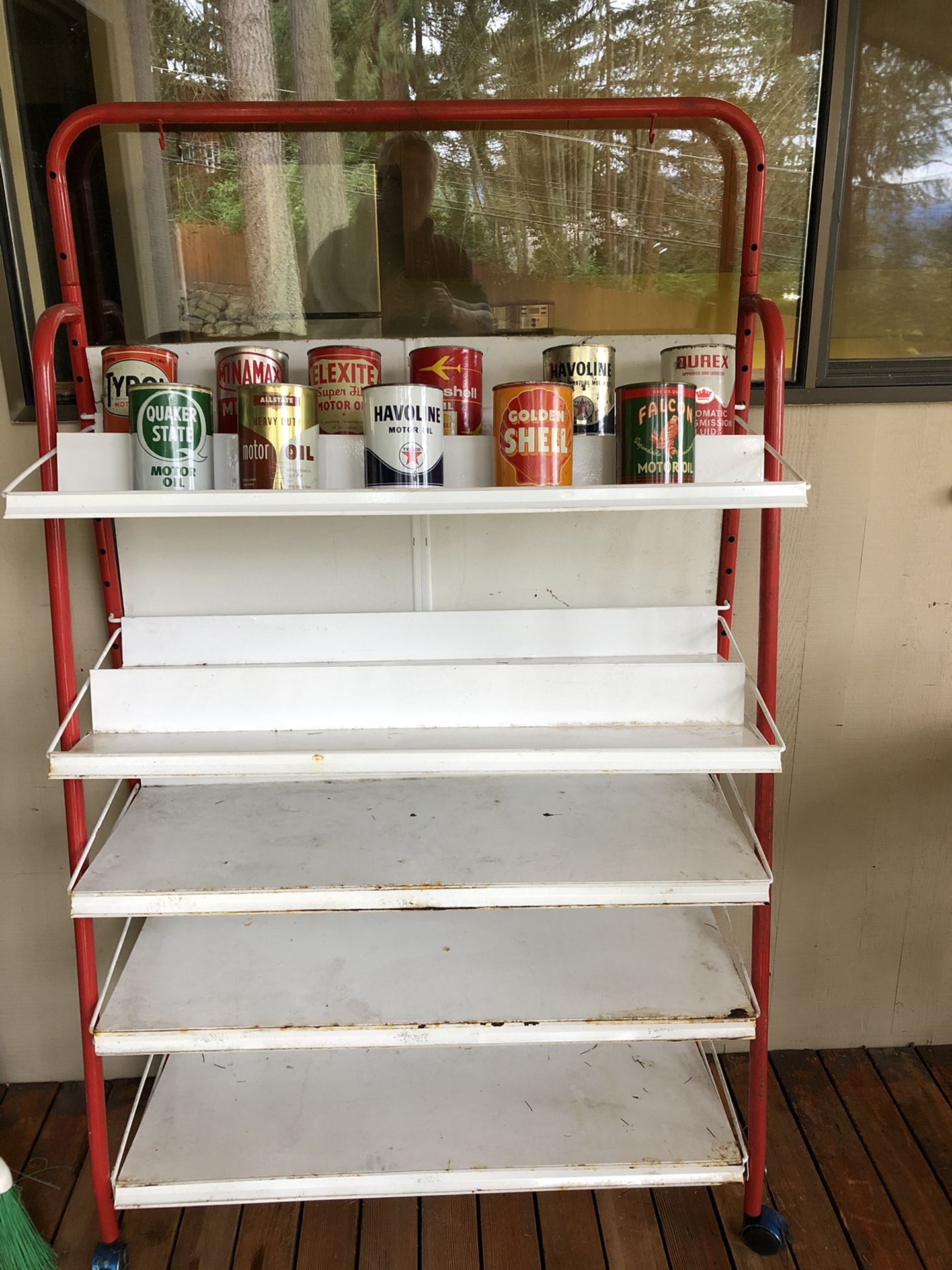 Vintage gas station rolling oil can rack display Petroliana