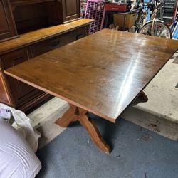 Solid Table With Extensions